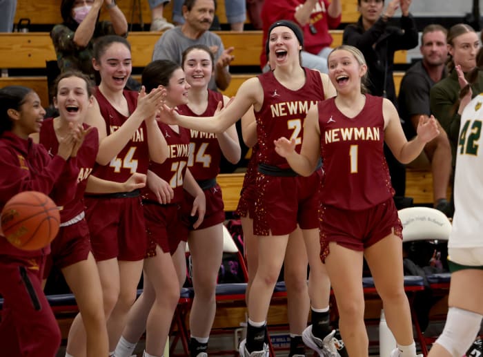 Newman girls enjoying the final moments of Saturday's win.